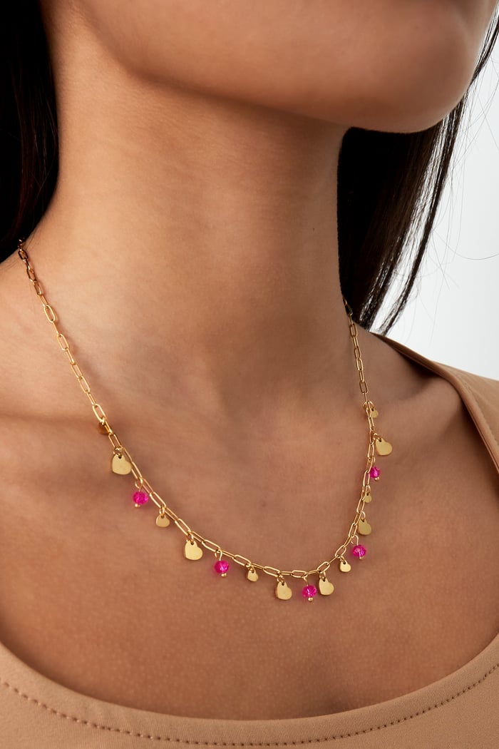 mooie etting met goed en roze bedels